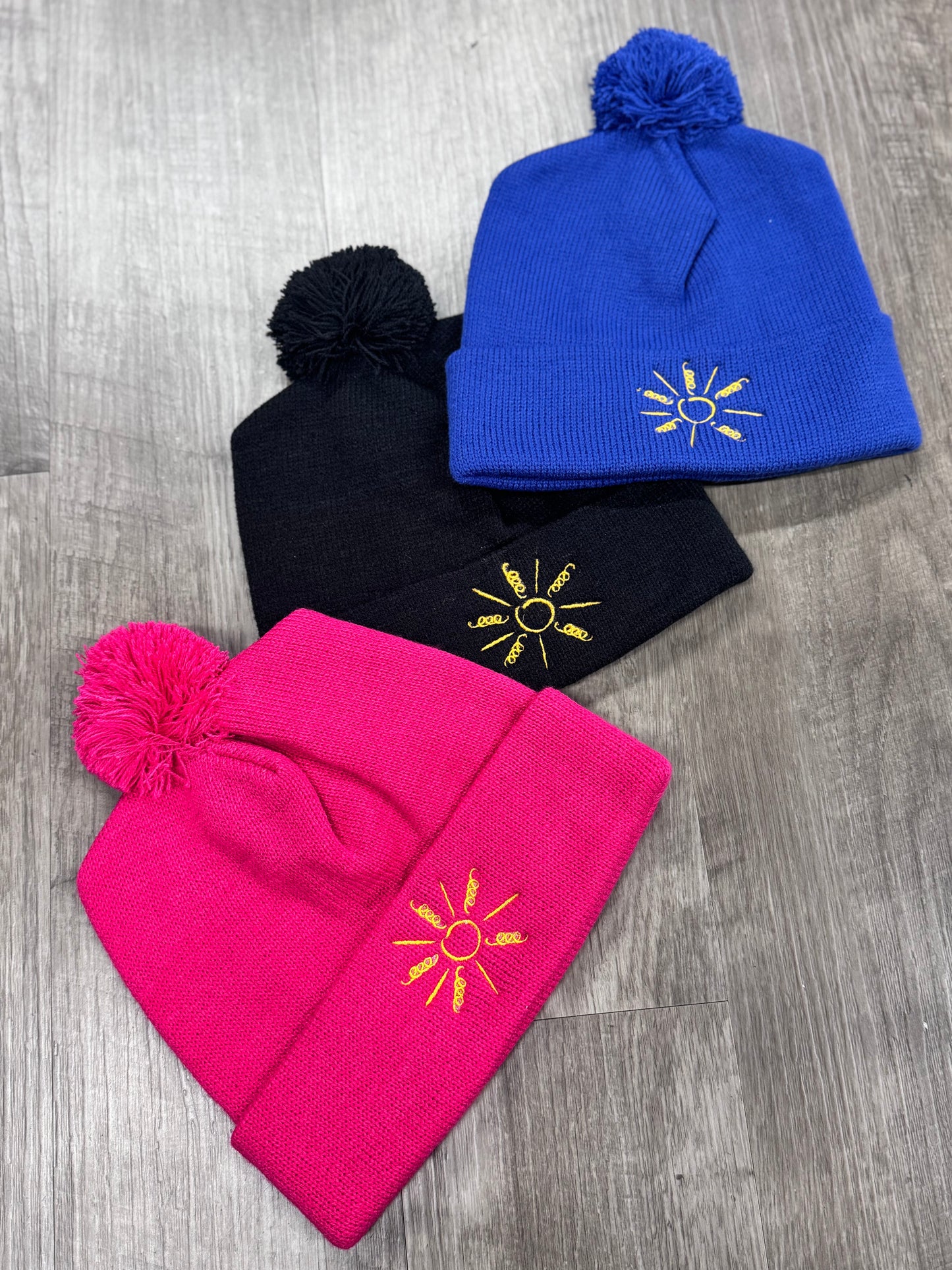 RAE OF SUNSHINE TOBOGGAN WITH POM